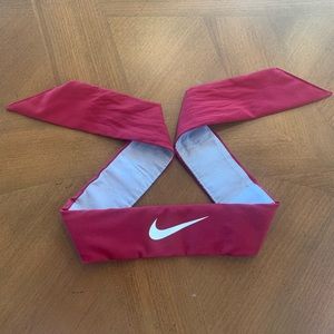 Nike tie around headband. Color is maroon